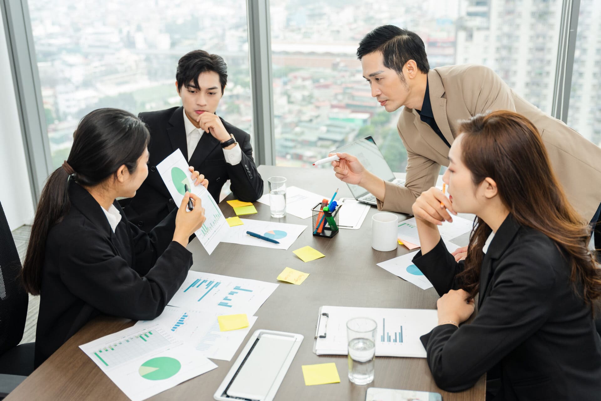 image of a group of Asian businessmen working together at the company